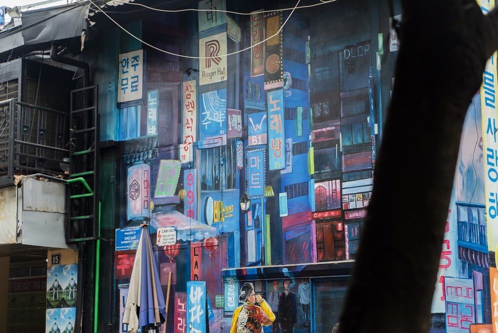 Paint By Numbers | Hanoi - Man In Yellow Shirt Standing In Front Of Store - Custom Paint By Numbers