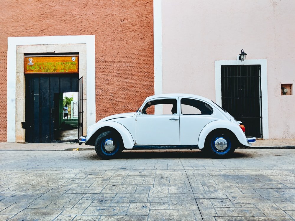 Paint By Numbers | Beetle - White Volkswagen Beetle Parked Near Building During Daytime - Custom Paint By Numbers