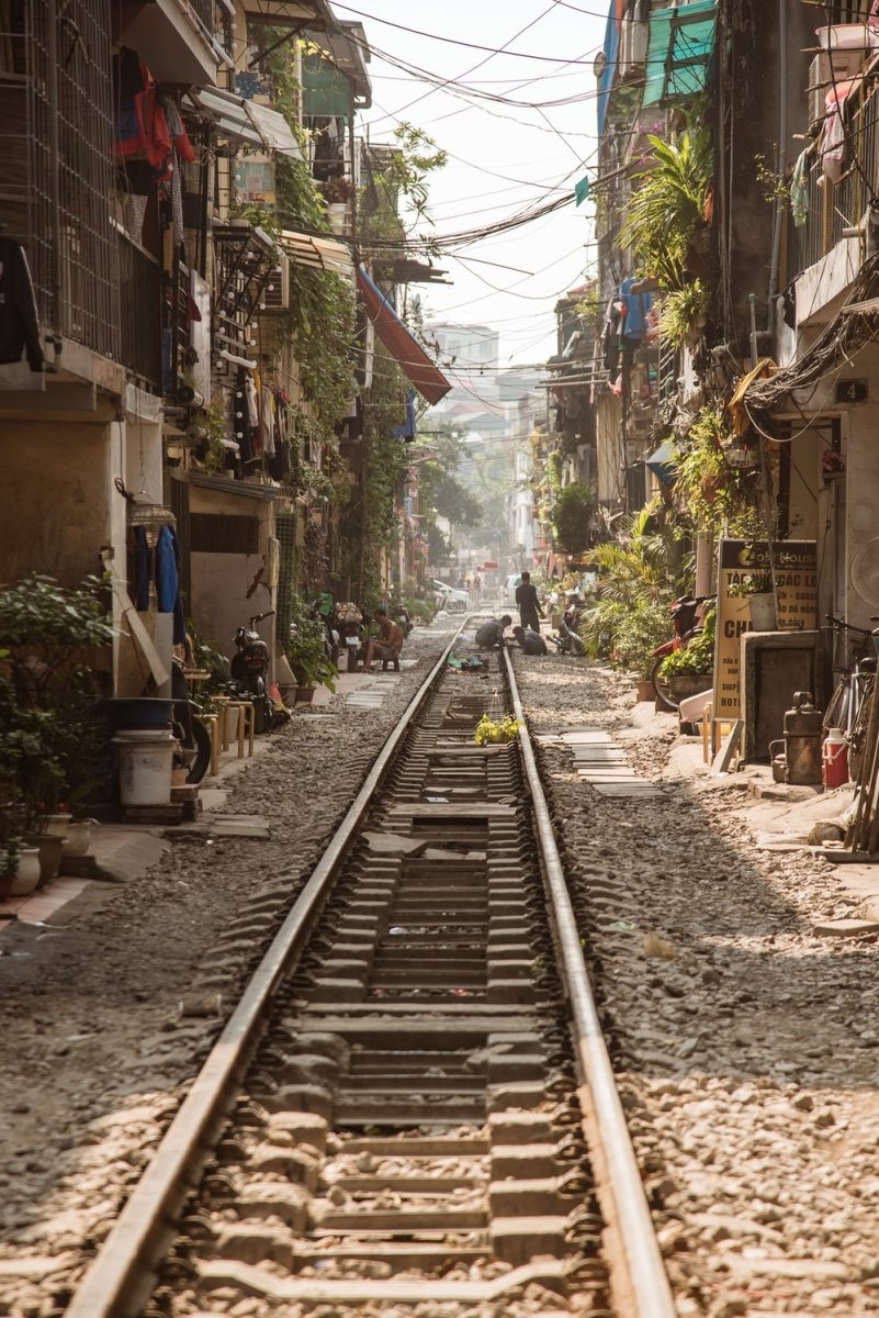 Paint By Numbers | Hanoi - Train Rail Between Houses During Daytime - Custom Paint By Numbers