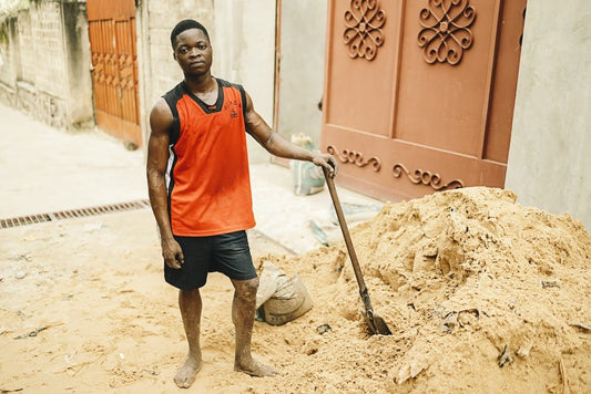 Paint By Numbers | Kinshasa - Man In Red Tank Top And Black Shorts Holding Shovel - Custom Paint By Numbers