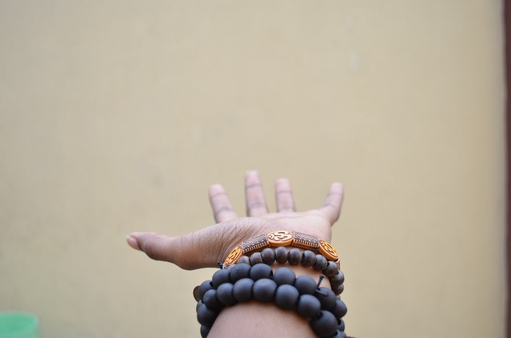 Paint By Numbers | Lagos - Person Hand With Black Beaded Bracelets - Custom Paint By Numbers