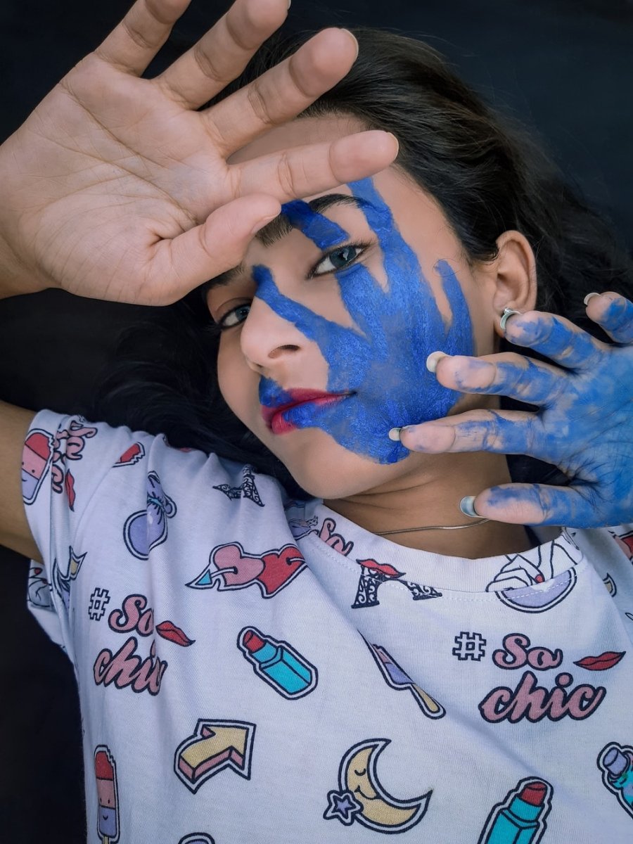 Paint By Numbers | Lucknow - Girl In White And Red Shirt With Blue Paint On Face - Custom Paint By Numbers