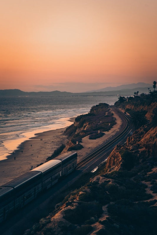 Paint By Numbers | San Diego - White And Black Train On Rail Near Body Of Water During Sunset - Custom Paint By Numbers