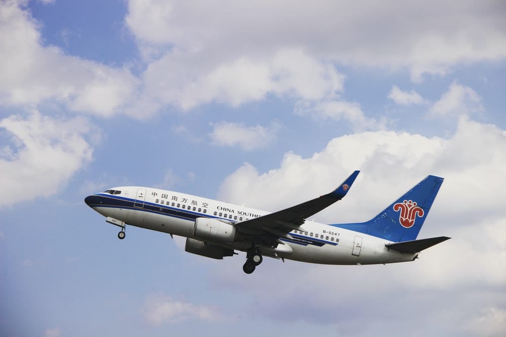 Paint By Numbers | Shenyang - White And Blue Airplane Under Blue Sky During Daytime - Custom Paint By Numbers
