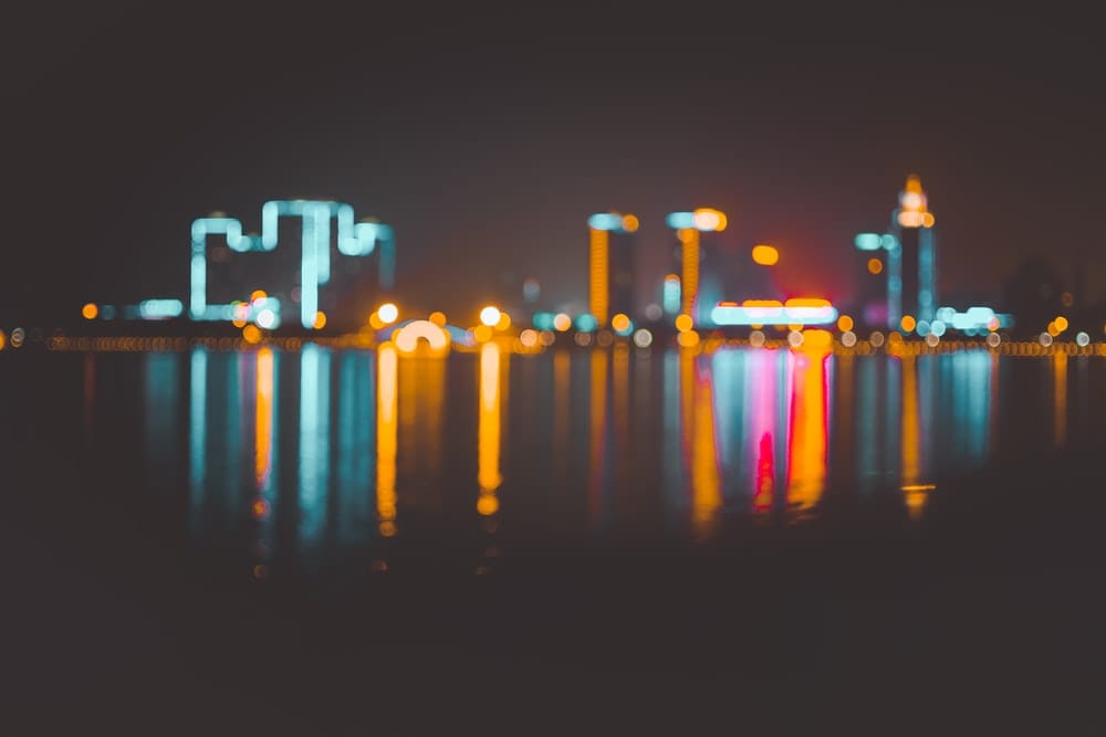 Paint By Numbers | Yulin - Bokeh Photography Of Cityscape On Body Of Water - Custom Paint By Numbers